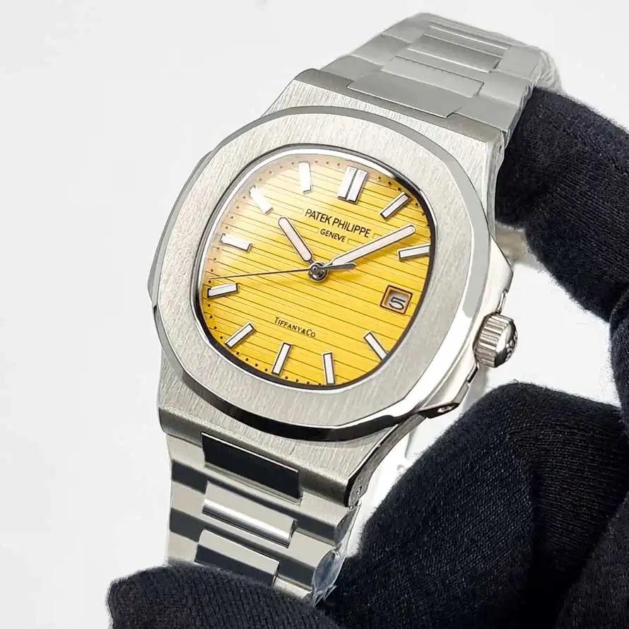 1414 ساعت مچی پتک فیلیپ ناتیلوس مردانه صفحه زرد Patek Philippe - Image 1