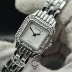 ساعت کارتیه زنانه دور جواهر صفحه سفید با بند استیل نقره ای رفرنس 6255 Cartier - Image 2